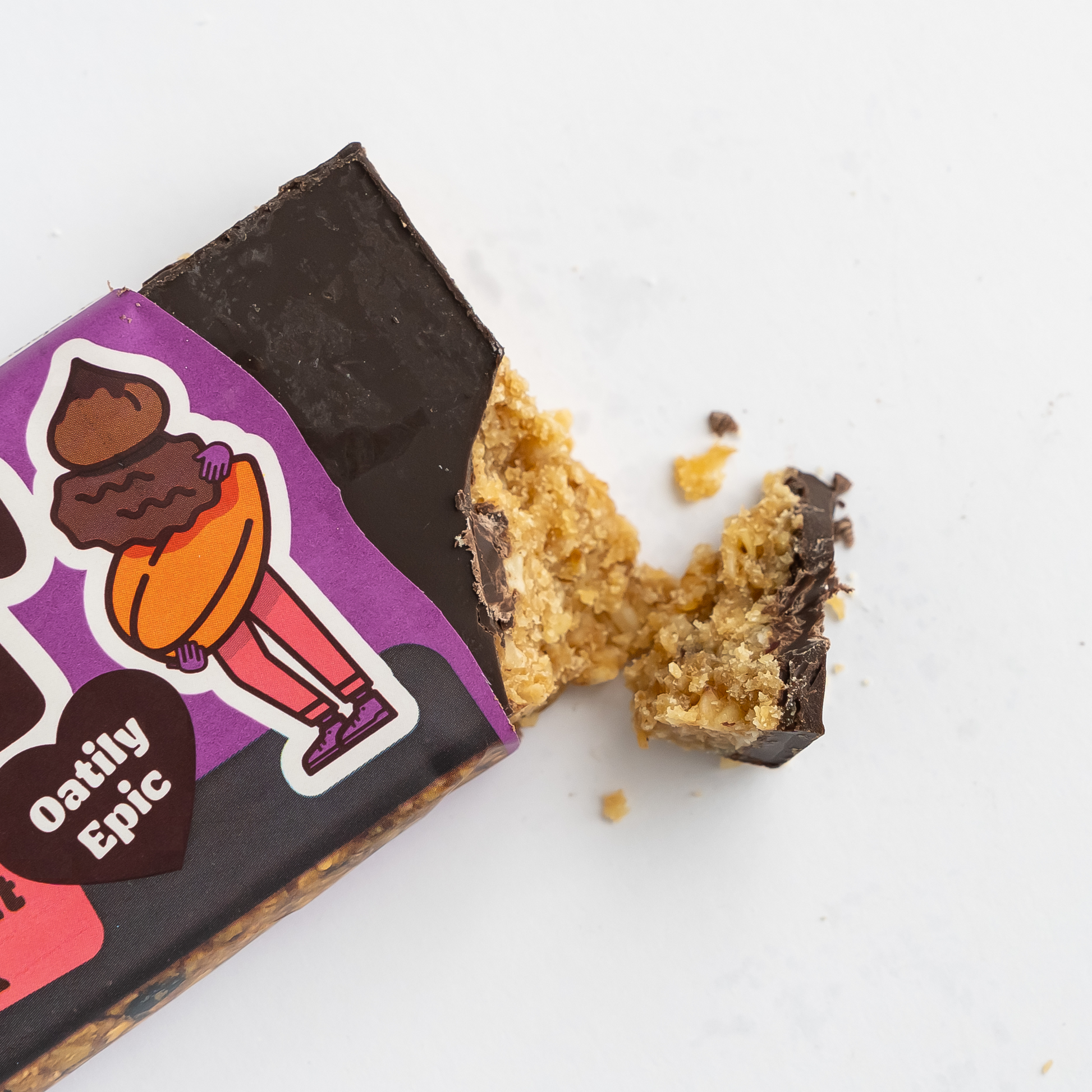 A close up of a half opened Topped Choc Fruit + Nut Giant Bar